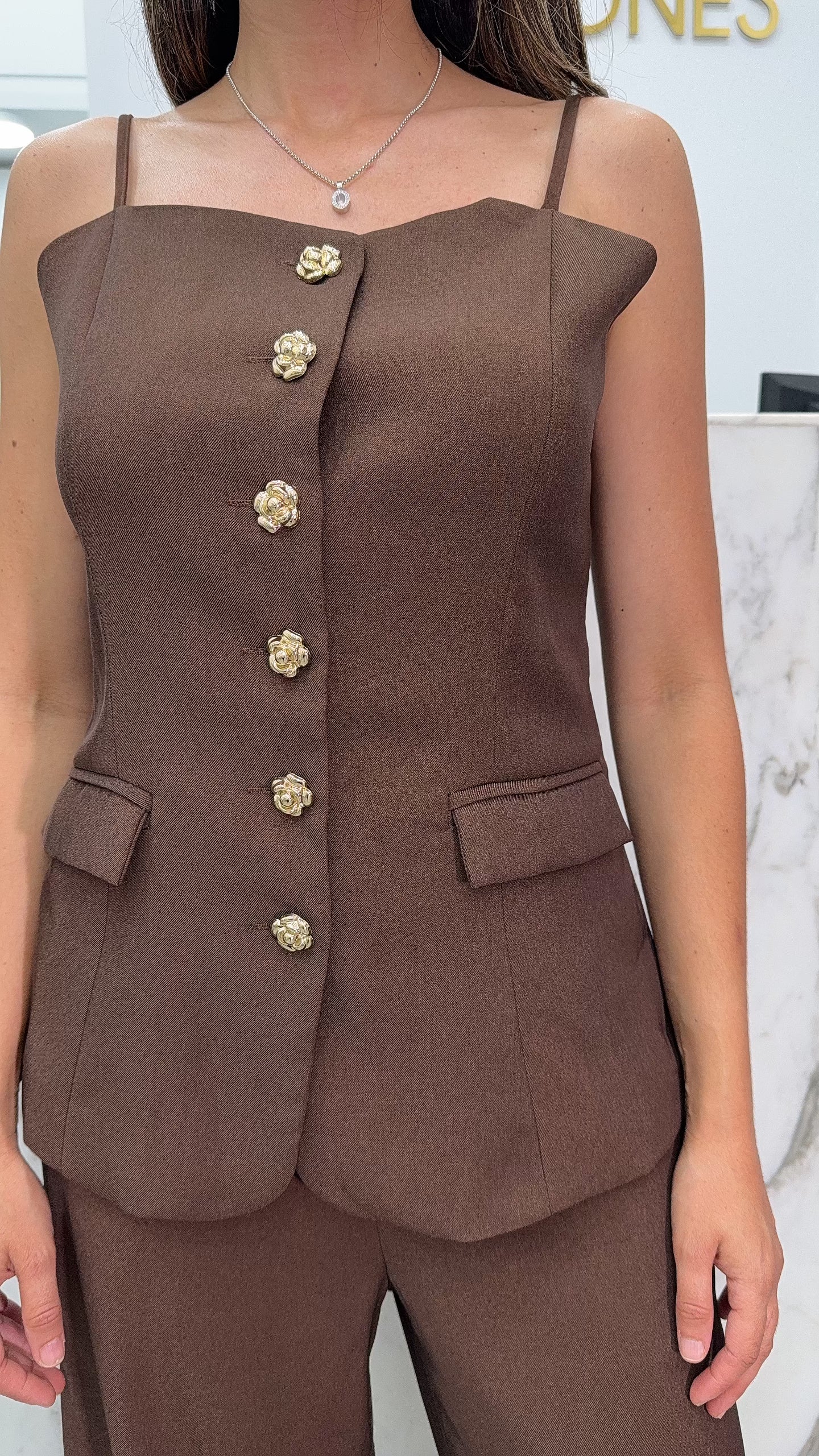 Ensemble bretelles boutons dorées marron
