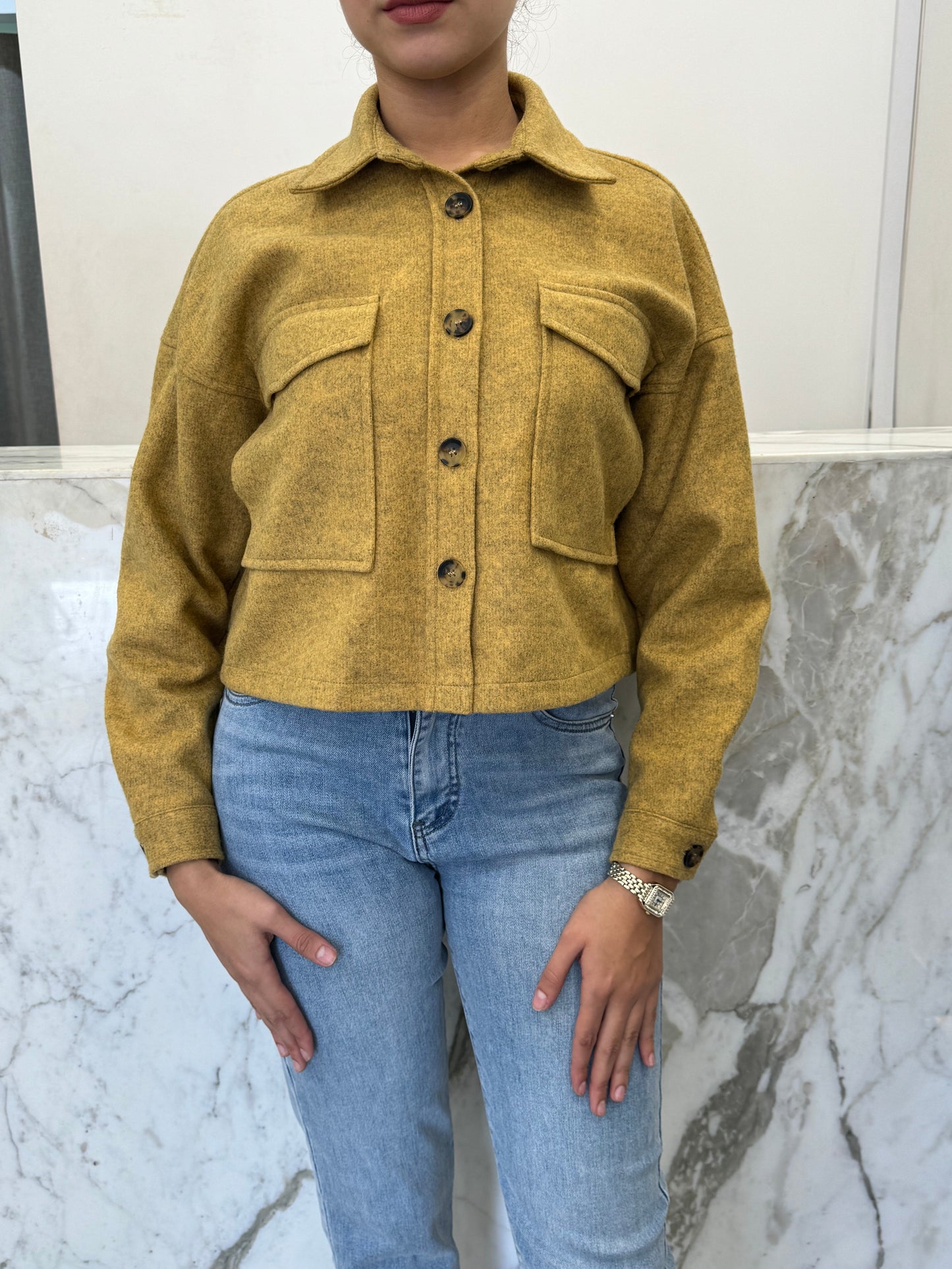 veste épaisse courte bouton