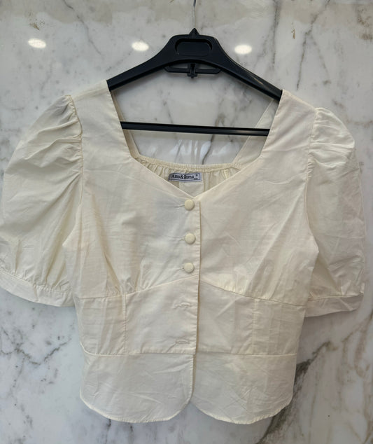 top bouttons crème