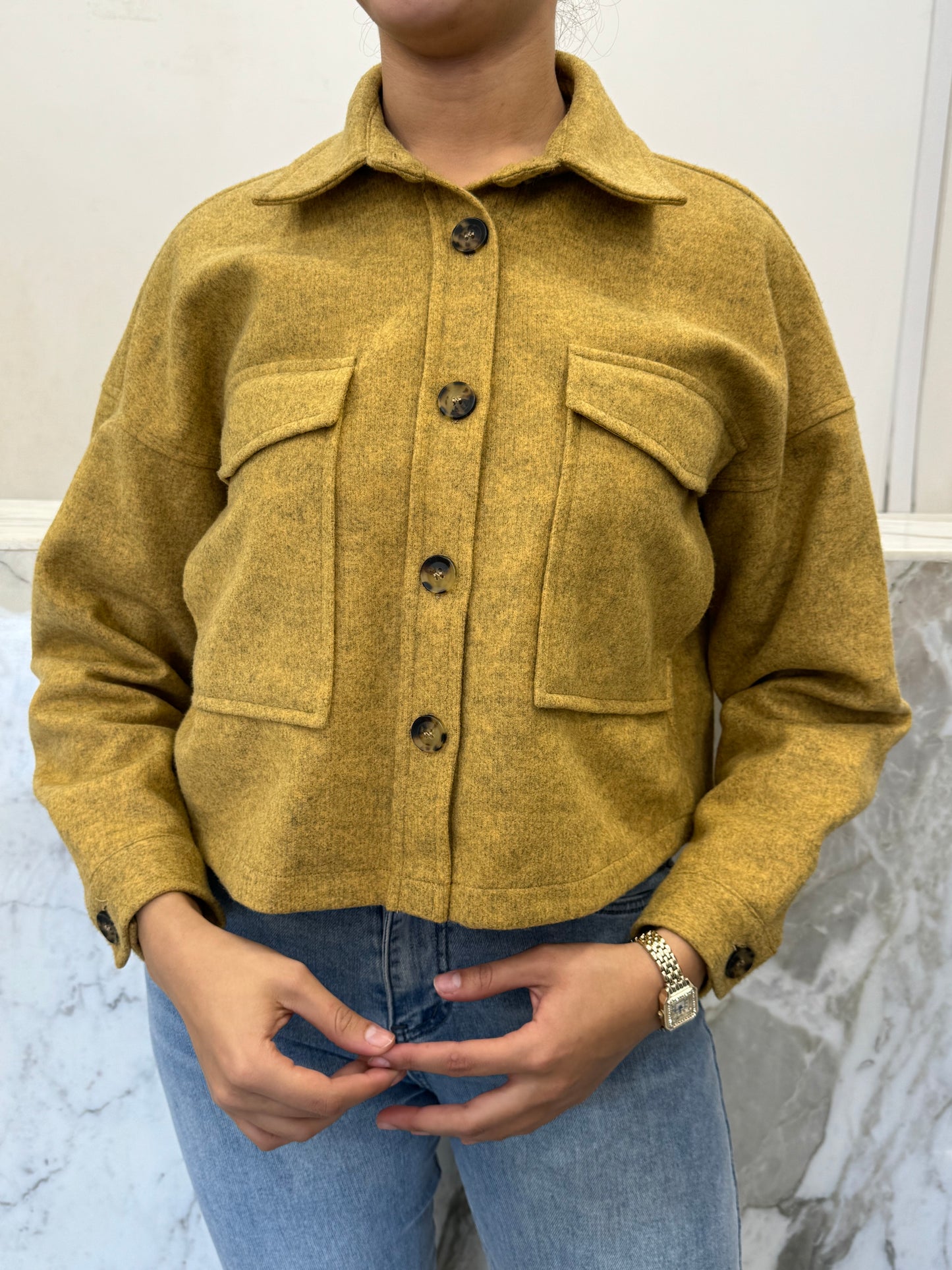 veste épaisse courte bouton